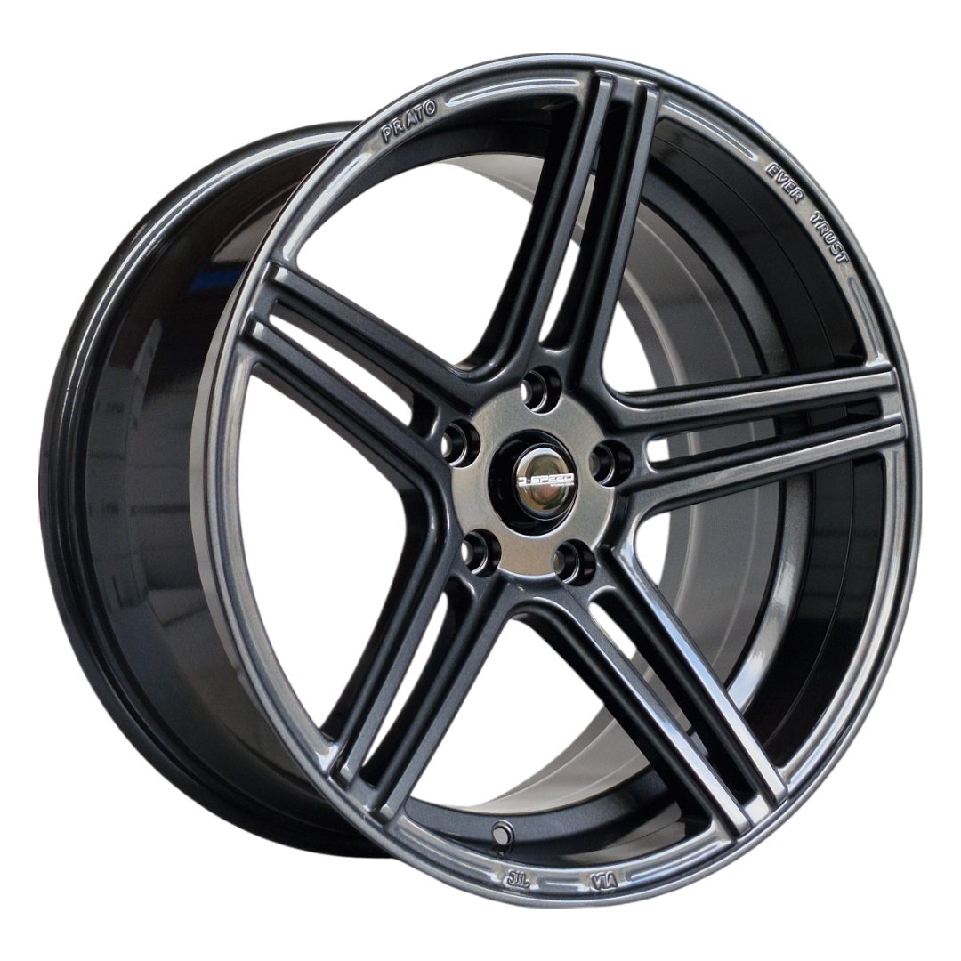 Black alloy wheel on a white background