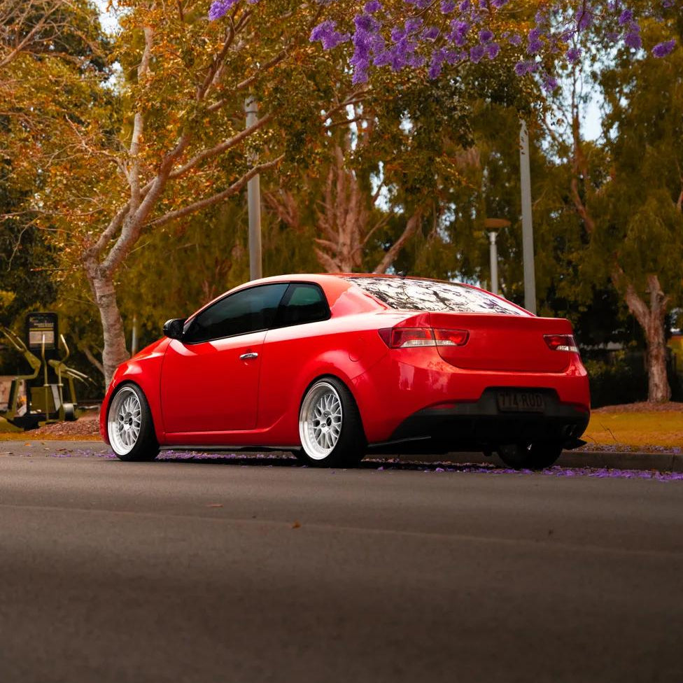 Red Kia Cerato on the streets lowered with dspeed d-speed DS-06 ds06 18x8.5 +35 5x114.3