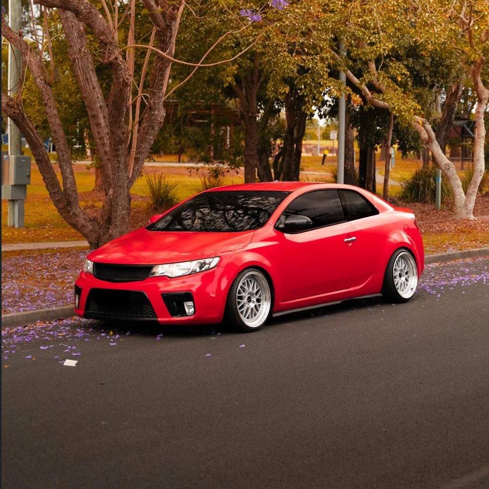 Red Kia Cerato on the streets lowered with dspeed d-speed DS-06 ds06 18x8.5 +35 5x114.3