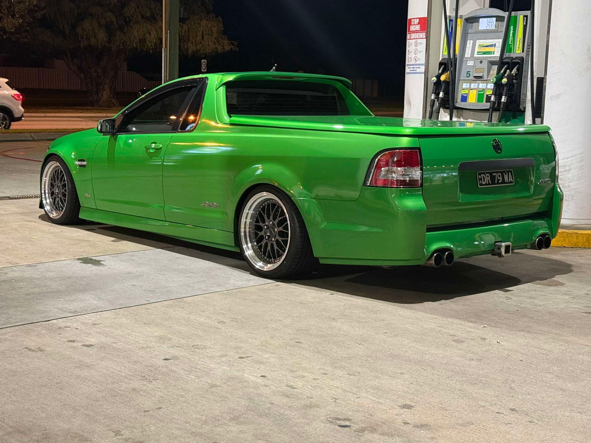 A bright green modified Holden Commodore Super LS pickup truck parked on a grassy lawn outdoors. dspeed ds06 D-speed DS-06 19inch 19x8.5 19x9.5 dish dished wheels rims tyres