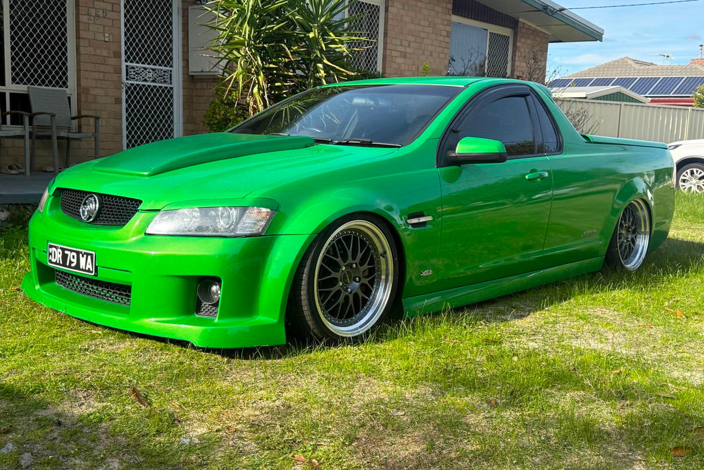 A bright green modified Holden Commodore Super LS pickup truck parked on a grassy lawn outdoors. dspeed ds06 D-speed DS-06 19inch 19x8.5 19x9.5 dish dished wheels rims tyres
