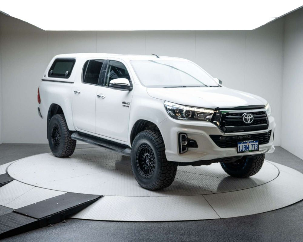 A white Toyota Hilux n80 duel cab pickup truck with a black grille, Satin black DSpeed D-Speed mh-2 mh2 wheels with roadcruza offroad all terrain tyres 275/70R17 4x4 rims wheels alloys off road