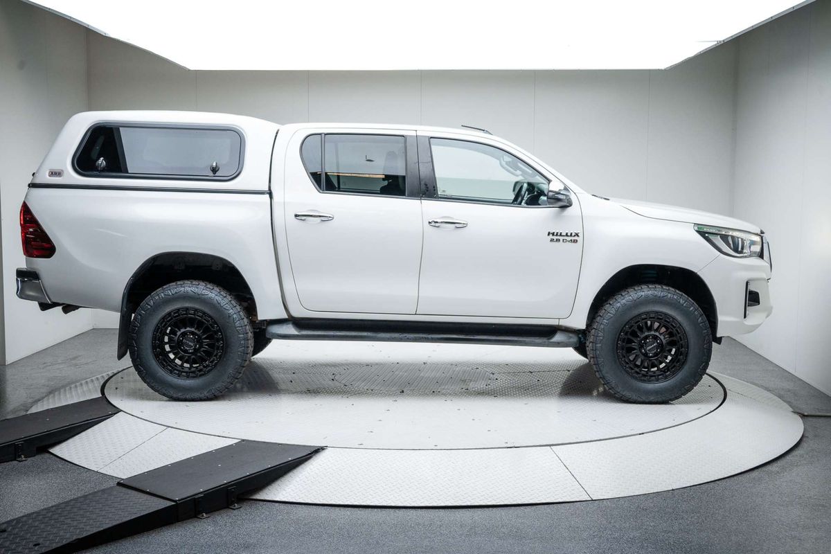 A white Toyota Hilux double cab pickup truck with a black grille, Satin black DSpeed D-Speed mh-2 mh2 wheels with roadcruza offroad all terrain tyres 275/70R17 4x4 rims wheels alloys off road