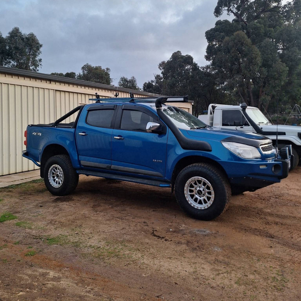 A blue pickup Holden Colorado RG with 285/70R17 Toyo open country tyres with DSpeed D-Speed xt1 xt-1 wheels. 4x4 wheels rims offroad off road
