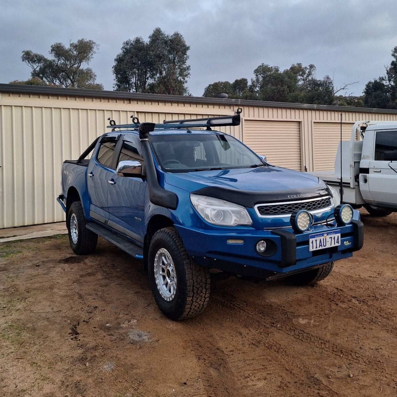 A blue pickup Holden Colorado RG with 285/70R17 Toyo open country tyres with DSpeed D-Speed xt1 xt-1 wheels. 4x4 wheels rims offroad off road