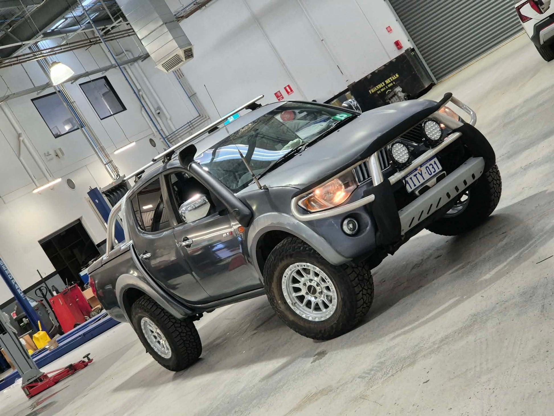 Silver mitsubishi triton ute SUV with dspeed d-speed XT1 xt-1 wheels 4x4 alloy wheel