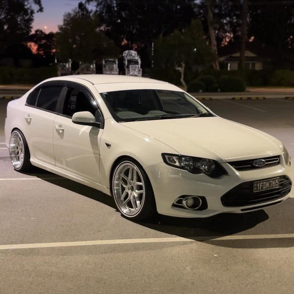 White ford falcon FG sedan car parked on a street with trees in the background Dspeed D-Speed DS09 ds-09 wheels 19x8.5 19x10.5 alloy wheels rims tyres wheel