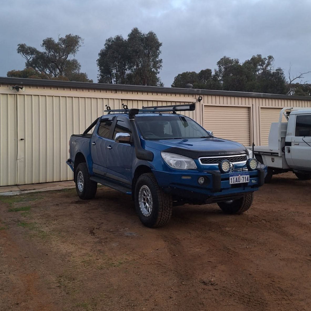 A blue pickup Holden Colorado RG with 285/70R17 Toyo open country tyres with DSpeed D-Speed xt1 xt-1 wheels. 4x4 wheels rims offroad off road